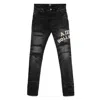 Amiri Hollywood Repaired Jean Distressed Skinny Jeans In Black
