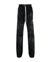 Amiri Cracked-dye Logo Track Pants In Black