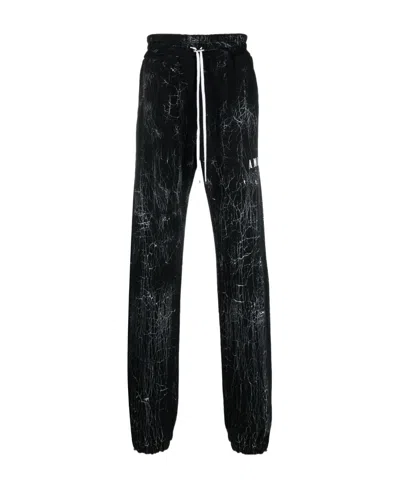 Amiri Cracked-dye Logo Track Pants In Black