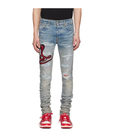 Amiri Denim Pants With Broken Holes In Gray
