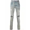 Amiri Mx1 Distressed Leopard Panel Skinny Jeans