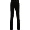 Amiri Slim Fit Distressed Trousers With Rivet Detailing