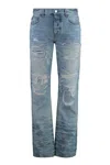 Amiri Blue Jeans With Ripped Details On The Front And Logo Patch On The Rear In Blue