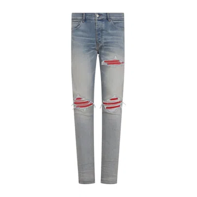 Amiri Distressed Blue Cotton Jeans With Red Accents