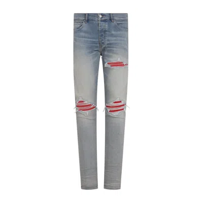 Amiri Mx1 Slim Fit Jeans With Distressed Red Accents In Blue