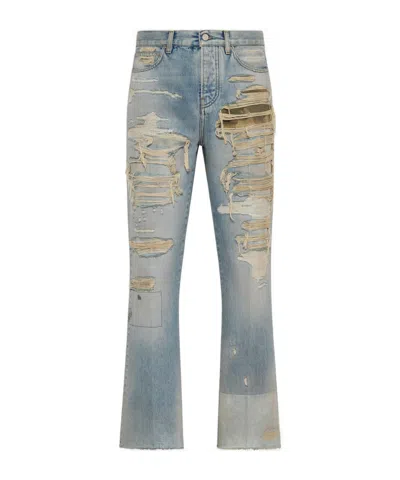 AMIRI AMIRI DISTRESSED BOOT CUT JEANS