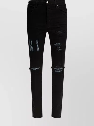 Amiri Distressed Denim Trousers Embellished Detailing In Black