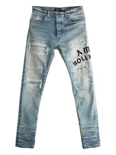 Amiri Distressed Embroidered Jeans In Blue