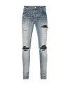 Amiri Distressed-finish Ripped Skinny Jeans In Gray