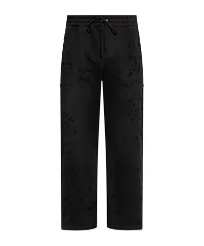 AMIRI DISTRESSED FINISH STRAIGHT-LEGGED JOGGING TROUSERS