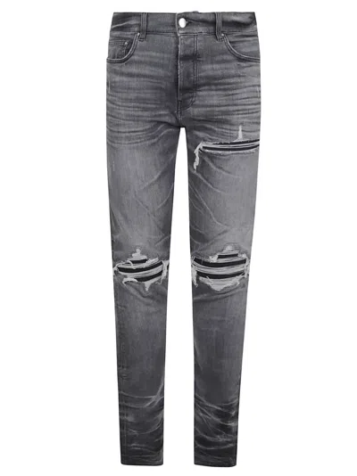 Amiri Distressed Grey Denim Jeans With Ripped Details In Gray