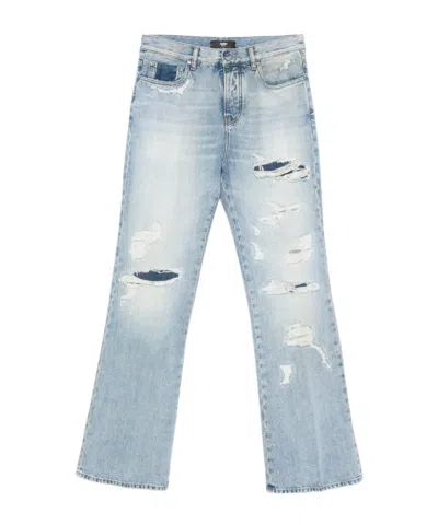 AMIRI DISTRESSED JEANS