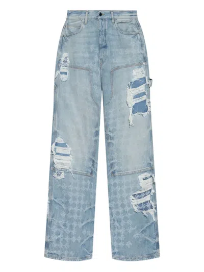 Amiri Distressed Patchwork Jeans