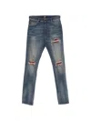 Amiri Distressed Patchwork Jeans In Blue