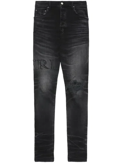 Amiri Distressed Skinny Jeans In Black