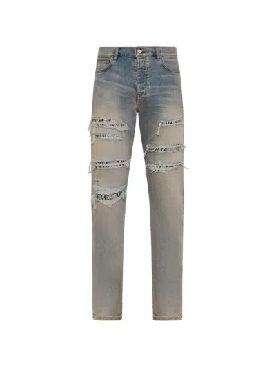 Amiri Distressed Snake Slim Jeans In Blue
