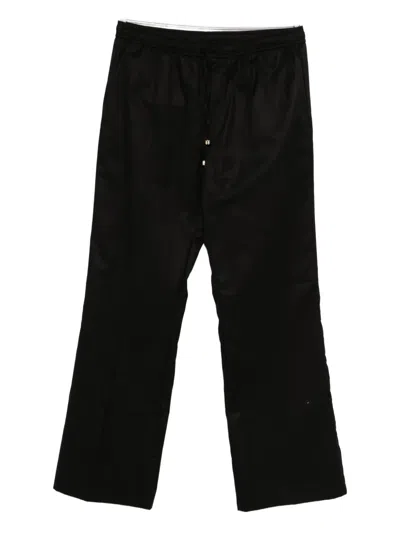 Amiri Drawstring-fastening Trousers In Black