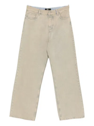 Amiri Faded Denim Jeans In Gray