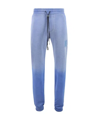 Amiri Faded Jersey Track Pants In Blue