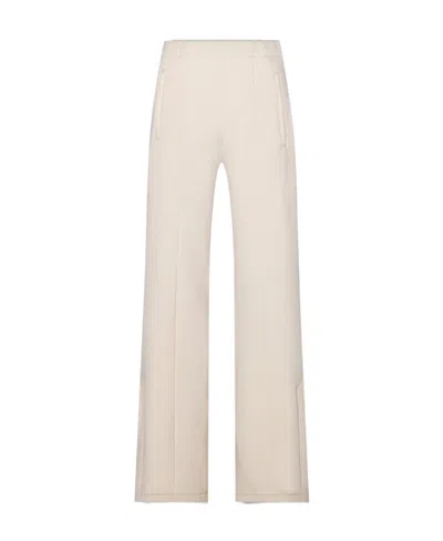 AMIRI FLARED-LEG JERSEY TROUSERS