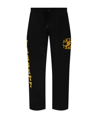 Amiri Flocked-logo Cotton Track Pants