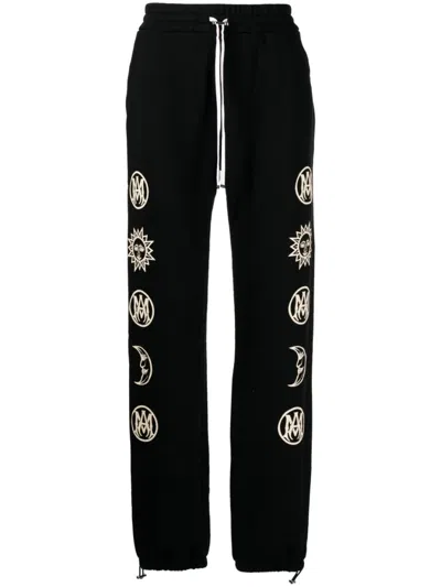Amiri Graphic-print Trousers In Black