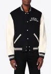 Amiri Varsity Jacket With White Contrasting Sleeves And Embroidered Detailing In Black