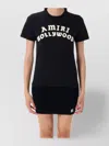 Amiri Hollywood Crew Neck Text Print Top In Black