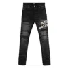 Amiri Hollywood Repaired Jean Distressed Skinny Jeans In Black