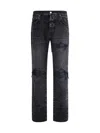Amiri Distressed Denim Trousers With Faded Detailing In Black