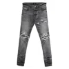 Amiri Stretch Denim Jeans Distressed Detailing In Black