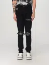 Amiri 'ma Quad Plais Mx1' Black Jeans With Ripped Details On The Front And Decorative Patches In Schwarz