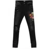Amiri Slim Fit Black Distressed Jeans With Colorful Patches In Black