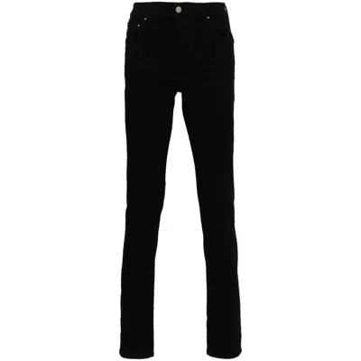 Amiri Stack Skinny Jeans In Black