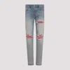 Amiri Mx1 Slim Fit Jeans With Distressed Red Accents