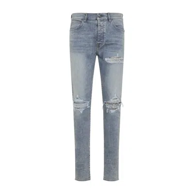 Amiri Distressed Jean Embroidered Pocket In Blue