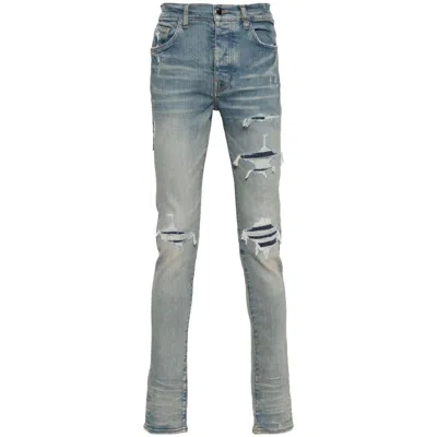 Amiri Logo-patch Ripped Skinny Jeans In Blue