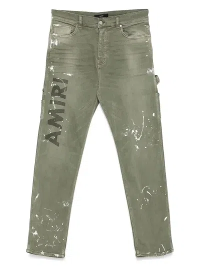 AMIRI LOGO-PRINT JEANS