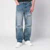 Amiri Men Blue Jeans With Ripped Details On The Front And Logo Patch On The Rear In Denim Man In Blue
