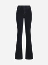 Amiri Stretch Cotton Denim Flared Jeans In Faded Black