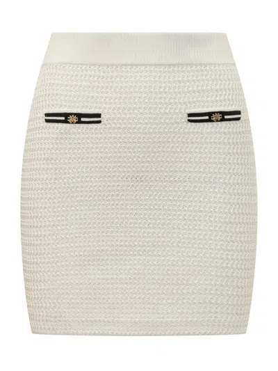 AMIRI AMIRI KNIT MINISKIRT WITH AMIRI LOGO DETAILS