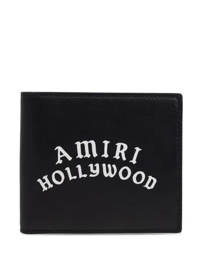 Amiri Bi-fold Wallwt With Logo Lettering On The Front In Leather Man In Black
