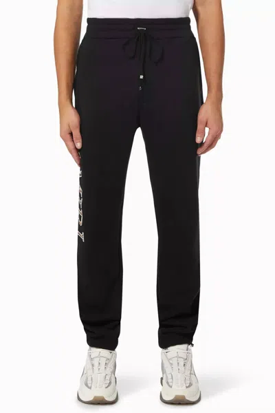 Amiri Leopard Applique Sweatpants In Black