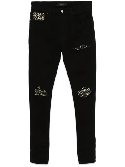 AMIRI LEOPARD-DETAIL JEANS