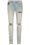 Amiri Mx1 Distressed Leopard Panel Skinny Jeans In Antique Indigo