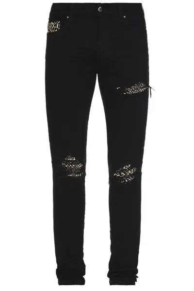AMIRI LEOPARD MX1 JEANS