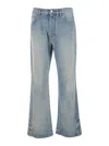 Amiri Light Blue Jeans With Flared Leg And Logo Patch On The Rear In Blue