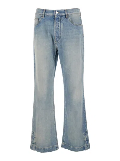 Amiri Light Blue Jeans With Flared Leg And Logo Patch On The Rear In Denim Man