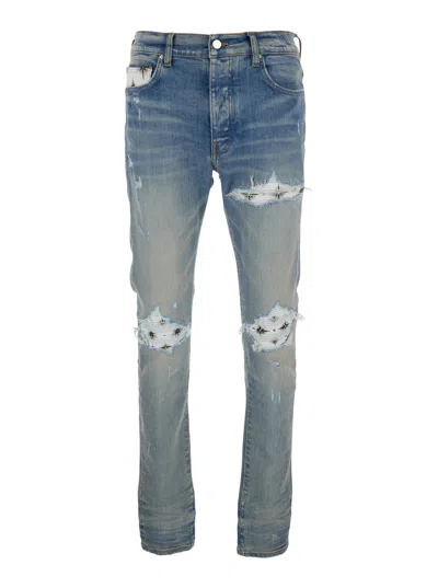 Amiri Light Blue Jeans With Ribbed Details On The Front And Logo Patch On The Rear In Denim Man