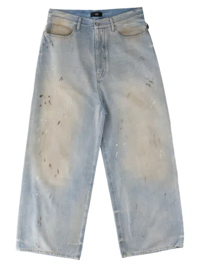 Amiri Light-wash Distressed Cotton Jeans In Blue